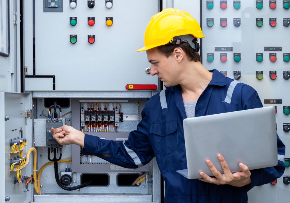 Nuclear power electrical technician in a control room